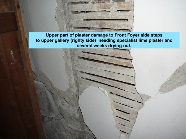 Close-up-of-stairwell-plaster-damage-